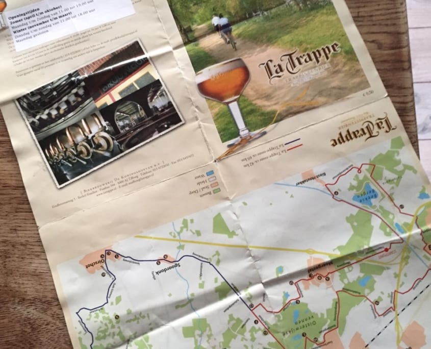 Deze kaart van de verschillende Trappistenroutes kun je zowel bij de VVV TIlburg als bij De Koningshoeven halen